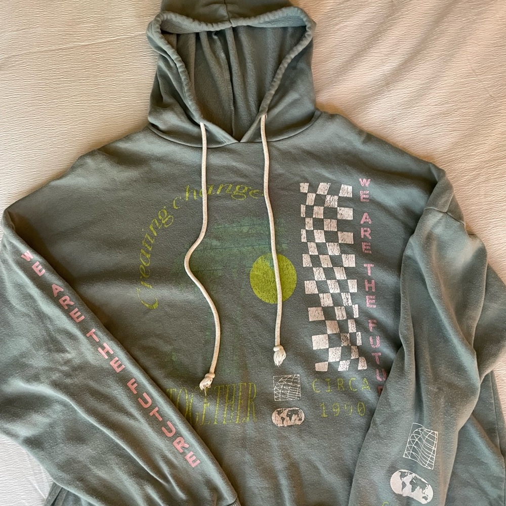 This is a soft green sweatshirt with no major flaws!